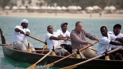 Sir Steve Redgrave (center) tries his hand at rowing a traditional Dhow. Sir Steve is in Dubai to help promote the upcoming Olympic Games in London 2012. Sammy Dallal / The National
