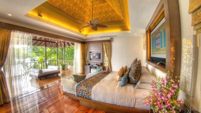 The guest bedroom in the royal villa at Bunga Raya Island Resort & Spa. Courtesy Bunga Raya Island Resort & Spa