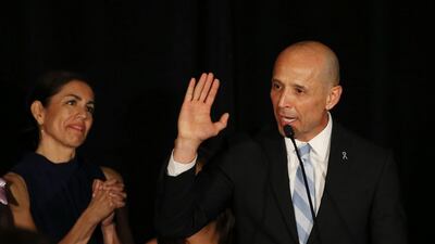 Democratic candidate for Arizona Governor David Garcia gives his concession speech as his wife, Lori, left, listens at an election-night gathering in Arizona. Garcia lost to Republican Gov. Doug Ducey. AP