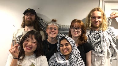 Charlotte Head, second from left, Samuel Corner, right, Fatema Rajwani, centre, and Elie Kamio, left, with two other protesters the night before the break-in