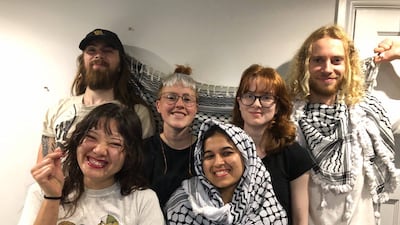 Charlotte Head, second from left, Samuel Corner, right, Fatema Rajwani, centre, and Elie Kamio, left, with two other protesters the night before the break-in