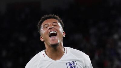 England's Jadon Sancho celebrates scoring their fourth goal. Reuters