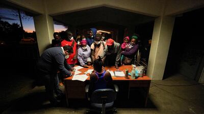 Haitian migrants are registered after arriving at a shelter on the Mexico-US border, in Mexicali, Mexico. Reuters