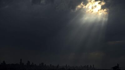Rays of sunshine break through the clouds over the Lebanese capital Beirut. AFP