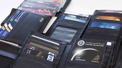 Debt consolidation products from banks offers overwhelmed borrowers some breathing space by rolling multiple debts into a single consolidated loan. Jaime Puebla / The National