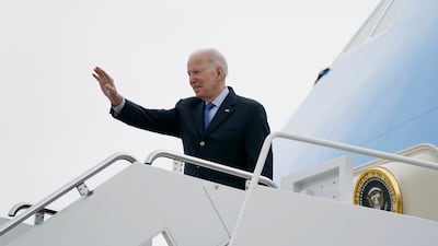 President Joe Biden waves as he boards Air Force One before travelling to meet allies in Europe. AP
