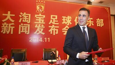 Fabio Cannavaro is introduced on Wednesday as Guangzhou Evergrande's new 'executive head coach' in Guangdong, China. Reuters / November 5, 2014