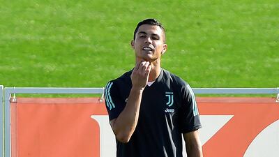Cristiano Ronaldo, centre, during training. Reuters