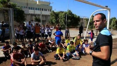 Manchester City Football Academy's Alan Dixon, right, said the four-day camp gave the Palestinian and Lebanese children a chance to not just have fun and relieve stress but learn some life lessons on communicating and working within a team.
