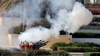 Members of the UAE Armed Forces perform a twenty-one gun salute.