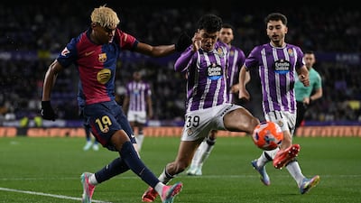 Adam Aznou, on loan at Real Valladolid, attempts to block a cross by Barcelona's Lamine Yamal. Getty Images