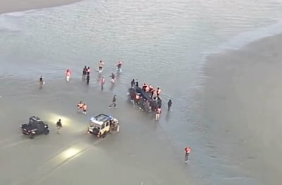 French law enforcement officers intercept a small boat attempting to carry migrants across the English Channel. Photo: UK Home Office