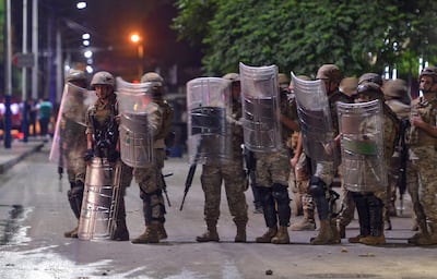 Lebanese army soldiers clash with anti-government protesters in the northern port city of Tripoli. AFP