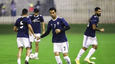 Iran midfielder Masoud Shojaei, centre, during a training session with the national team in Doha, Qatar. AFP