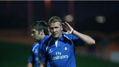 New responsibilities at work have forced Mike Cox-Hill, right, to retire from the UAE national rugby side.