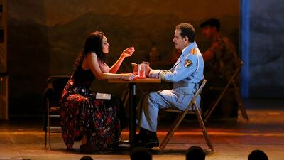 Katrina Lenk, left, and Tony Shalhoub, from the cast of "The Band's Visit," perform at the 72nd annual Tony Awards. Michael Zorn / Invision / AP
