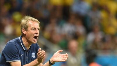 Jurgen Klinsmann brought the US to the knockout round of the 2014 World Cup. Francisco Leong / AFP