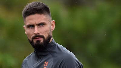 Chelsea striker Olivier Giroud attends a training session at Cobham ahead of the Champions League match against Ajax. AFP