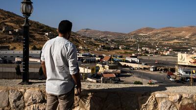 Mohammed, a civil engineer, was a childhood companion of the man who now smuggles Syrians across the border from the region of Masnaa near Syria. Thibault Lefébure for The National.