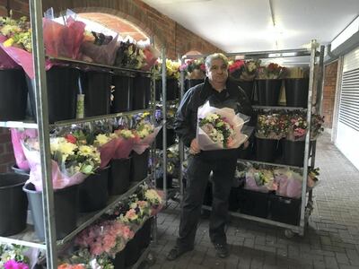 Mark Fitzpatrick with his unsold flowers in Salisbury. Photo by Paul Peachey/The National