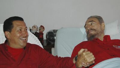 Venezuela’s president Hugo Chavez visits Fidel Castro during his recuperation from surgery in Havana. Castro died eight years after ill health forced him to formally hand power over to his younger brother Raul. Granma via AP