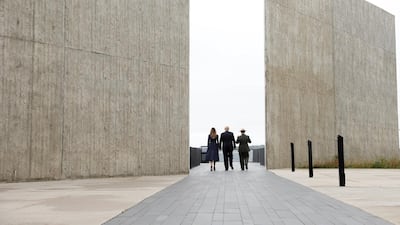 Trump and Melania walk with park superintendent Stephen Clark at the Flight 93 National Memorial. Reuters