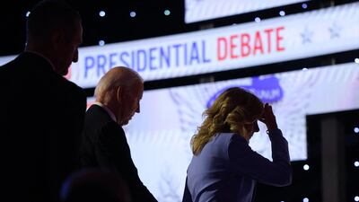 US President Joe Biden walks off the debate stage with his wife, Jill Biden, in Atlanta on Thursday. Reuters
