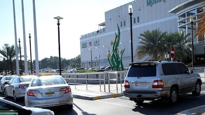 Taxis wait near Mushrif Mall entrance on Al Dhafra Street blocking the flow of traffic leading to the car park. Ravindranath K / The National