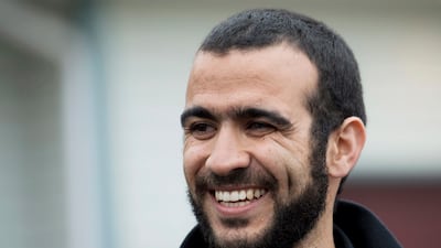 Omar Khadr speaks to the media outside his lawyer's home in Edmonton, Alberta on May 7, 2017. Nathan Denette / The Canadian Press via AP