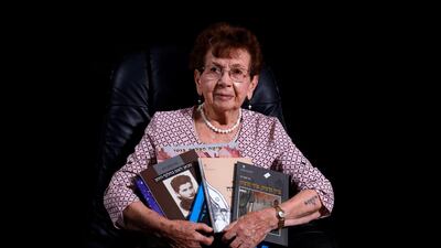 Holocaust survivor Batcheva Dagan, whose entire family was killed, poses with books she authored, during a photo session at her home in the Israeli town of Holon, south of Tel Aviv. Born in Poland in 1925, she became a pioneer in the field of Holocaust education, and has dedicated her life to teaching. Menahem Kahana / AFP