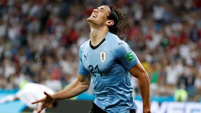Edinson Cavani of Uruguay celebrates scoring his side's first goal during the round of 16 match between Uruguay and Portugal. Juan Herrero / EPA