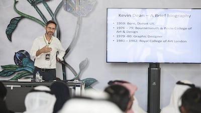 Kevin Dean returned to the mosque this week to meet with tour guides, students and visitors to discuss his work. Mona Al Marzooqi / The National