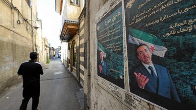 Election posters of Henry Hamra, a Syrian-American parliamentary candidate who, if elected, will be the first Jewish representative in the Syrian parliament since the late 1940s. AFP