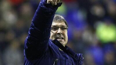 Barcelona coach Gerardo Martino has urged his players to keep their focus on the field while the club sorts out its boardroom mess. Juan Carlos Cardenas / EPA