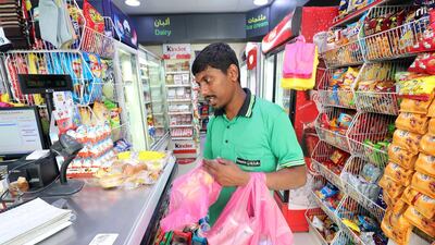 Shop local, like at a baqala, to support smaller businesses. Chris Whiteoak / The National