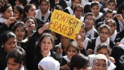 Indian students protest against the gang rape of a young woman at a demonstration in Jammu.