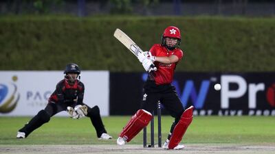 Kary Chan of Hong Kong plays a shot.