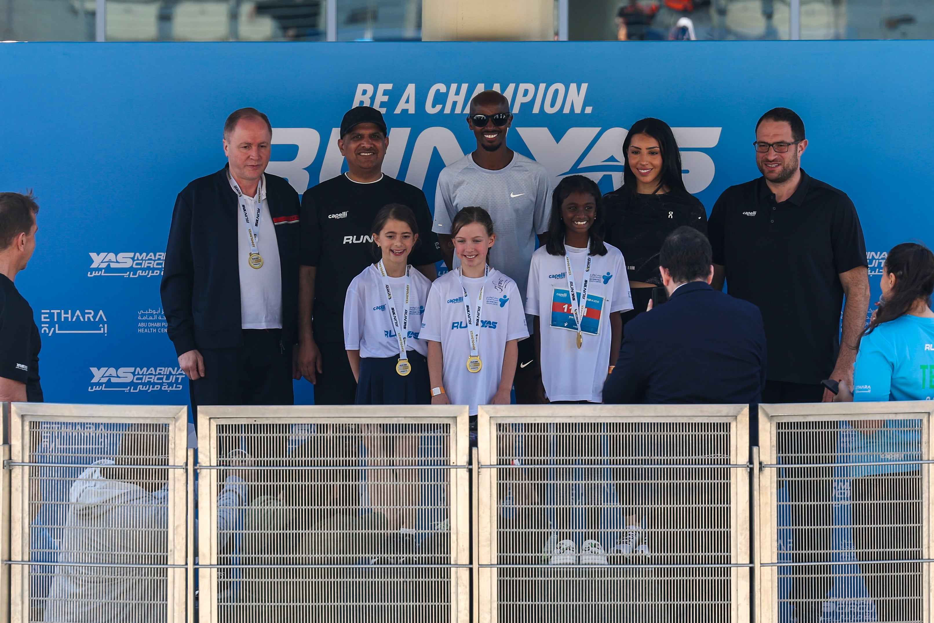 Yas Kids 1k girls winners with their awards