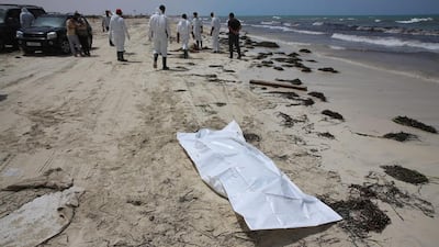 A body bag lies on a beach in Zwara, western Libya, where bodies of migrants begn washing up on June 2, 2016. Officials said on June 3 that the number of bodies found had reached 117. Mohame Ben Khalifa / EPA