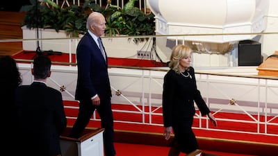 US President Joe Biden and first lady Jill Biden attend the service. Reuters
