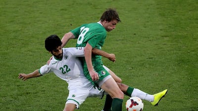 Manea Mohammed of Shabab, left, and Mads Kristiansand of NewYork Cosmos were entangled in action during their friendly. Satish Kumar / The National