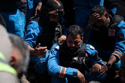 Mahdi Sahloum and colleagues attend the funeral of Mahdi Abu Zaid. Getty Images