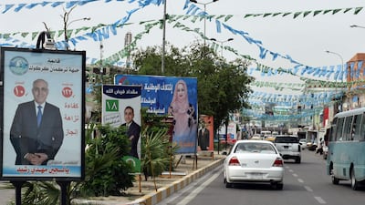 Electoral campaign posters are seen on May 8, 2018 in the multi-ethnic city of Kirkuk. Iraqi goes to the poll on May 12. Marwan Ibrahim / AFP