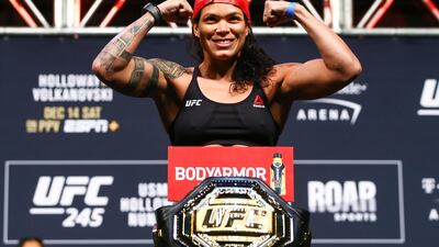 Amanda Nunes poses during the ceremonial weigh-in