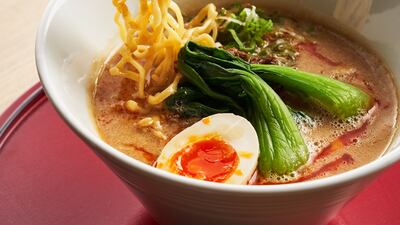 The spicy miso ramen broth is a stand-out dish.