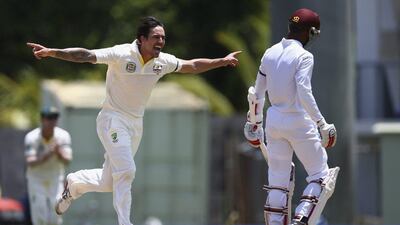 Mitchell Johnson of Australia celebrates after taking the wicket of Shai Hope of West Indies during Day 1 of the first Test in Dominica on Wednesday. Ryan Pierse / Getty Images / June 3, 2015