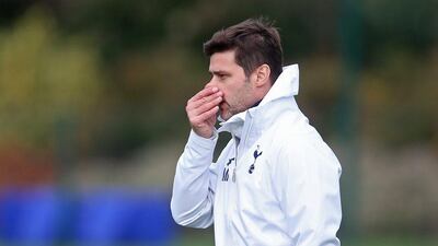Tottenham Hotspur manager Mauricio Pochettino shown observing his team on Wednesday during their training session. Matthew Childs / Action Images / Reuters