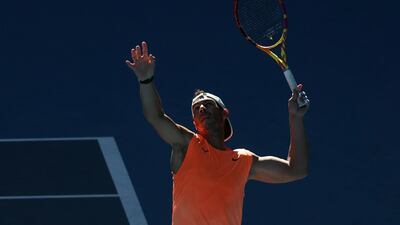 Rafael Nadal hits a serve during a practice session at Melbourne Park. Reuters