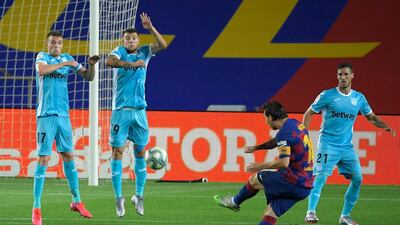 Lionel Messi attempts a free kick against Leganes. AFP