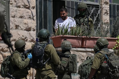 Israeli forces conduct a raid in Anata, in the occupied West Bank, on September 8. Reuters